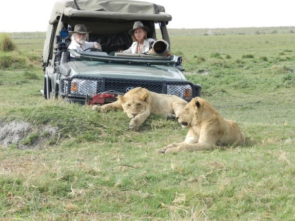 Filmmakers Dereck and Beverly Joubert, in their natural habitat, in Duba Plains camp, Botswana.