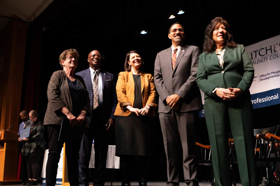 From left, Direct Support Professional student speaker Ellen Mayer, Dutchess Community College President Dr. Peter Grant Jordan, Office for People With Developmental Disabilities Commissioner Kerri Neifeld, SUNY Chancellor John B. King, Jr. and Dutchess County Executive Sue Serino pose at Dutchess Community College's regonition ceremony of the college's first cohort of 15 DSP students at the college's main campus on Wednesday, March 20.