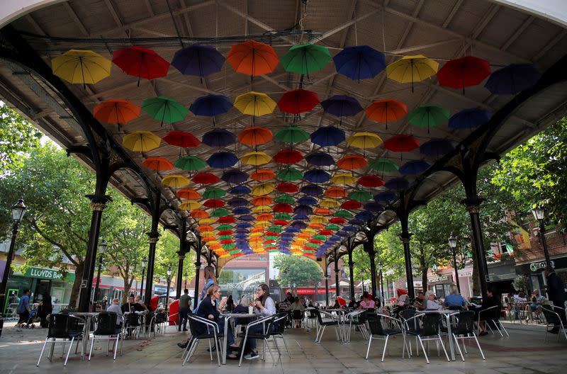 People spend time in the city centre amid the coronavirus disease (COVID-19) outbreak, in Warrington