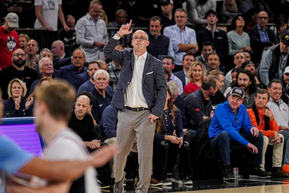 UConn head coach Dan Hurley gives instructions to his team during the first half of an NCAA college basketball game against North Carolina in New York, Tuesday, Dec. 5, 2023. (AP Photo/Peter K. Afriyie)