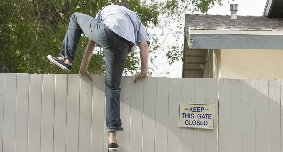 The man found himself caught up in more ways than one after climbing the fence. Source: Getty/ file photo.