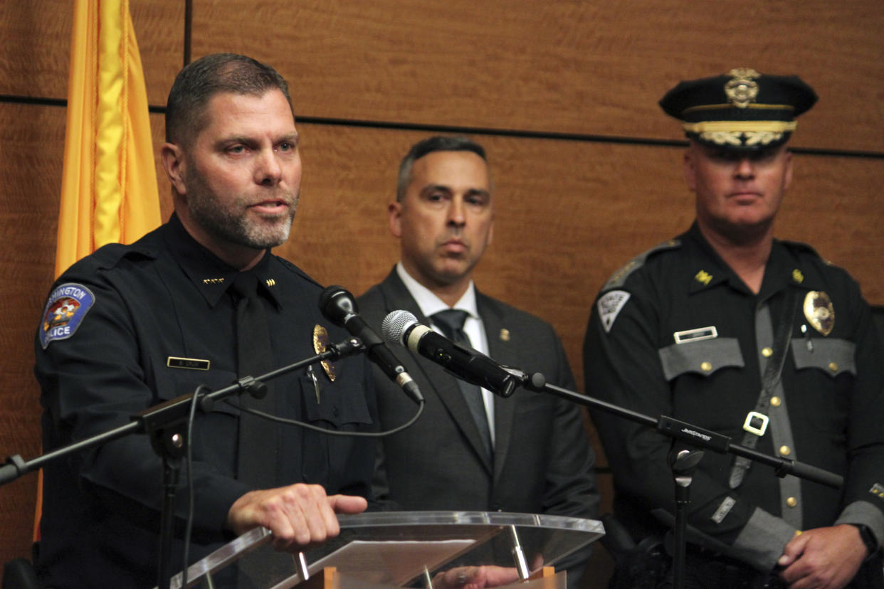 Farmington Deputy Police Chief Baric Crum, left, provides details about the deadly shooting during a news conference in Farmington, N.M. (Susan Montoya Bryan/AP)