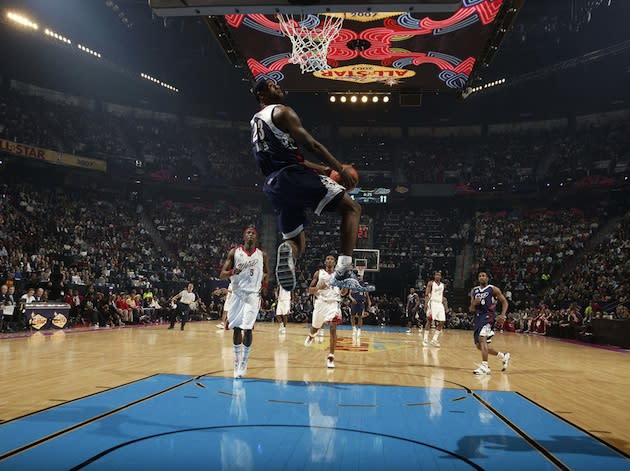 LeBron James throws down a reverse jam in a past All-Star game — Getty Images