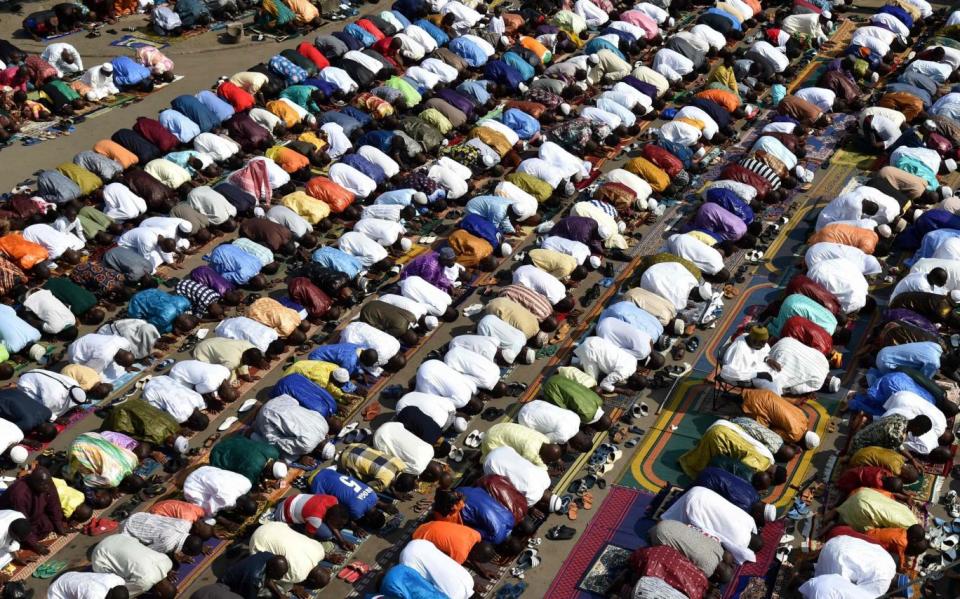 Muslim faithfuls pray to celebrate Eid al-Adha festival at Adjame mosque in Abidjan (AFP/Getty Images)