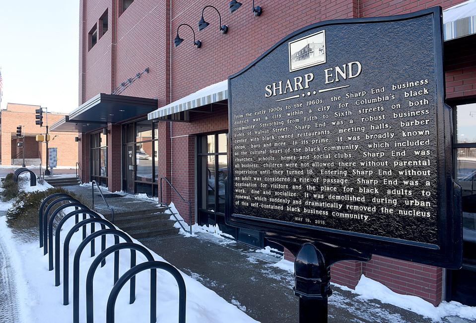 A sign in the 500 block of East Walnut St. commemorates the downtown area known for about 60 years beginning around 1900 as the Sharp End, where Black-owned businesses thrived within walking distance of downtown Columbia.