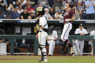 Mississippi State infielder Kellum Clark (11) hits a three-run home run against Vanderbilt during the seventh inning in Game 3 of the NCAA College World Series baseball finals, Wednesday, June 30, 2021, in Omaha, Neb. (AP Photo/Rebecca S. Gratz)