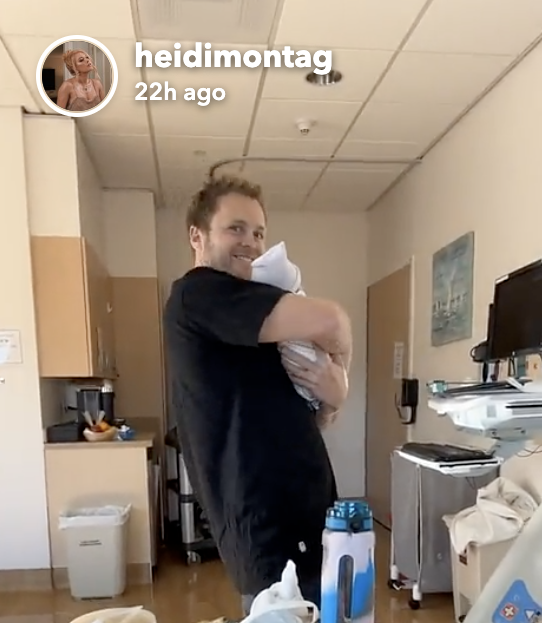 Spencer Pratt holds his newborn at the hospital. (Heidi Montag / Snapchat)