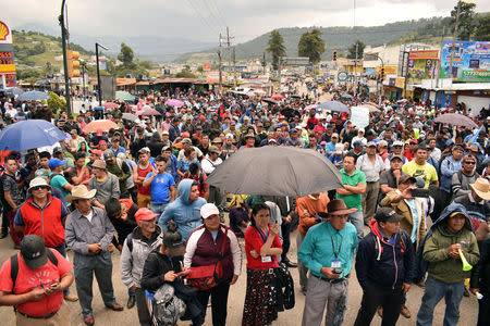 Demonstrators block a road during a protest against Guatemala's President Jimmy Morales in Totonicapan, Guatemala September 11, 2018. REUTERS/Stringer