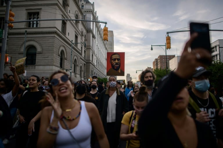 Black Lives Matter protesters in New York on the anniversary of the death of George Floyd, who was murdered by a white officer