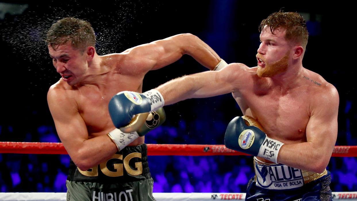  (R-L) Canelo Alvarez throws a punch at Gennady Golovkin 