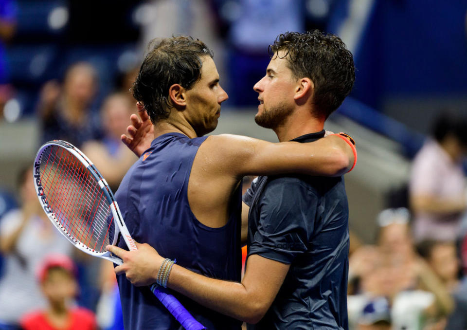 Rafael Nadal of Spain commiserates with Dominic Thiem of Austria after beating him in the quarter finals of the US Open on September 04, 2018 in New York City, United States. (Photo by TPN/Getty Images)