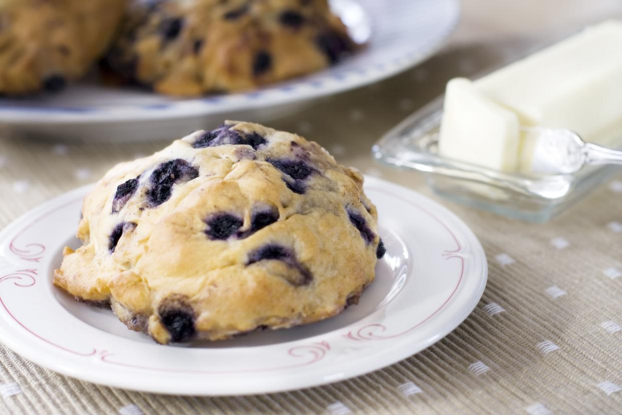 Blueberry scone on bread plateRelated Images: