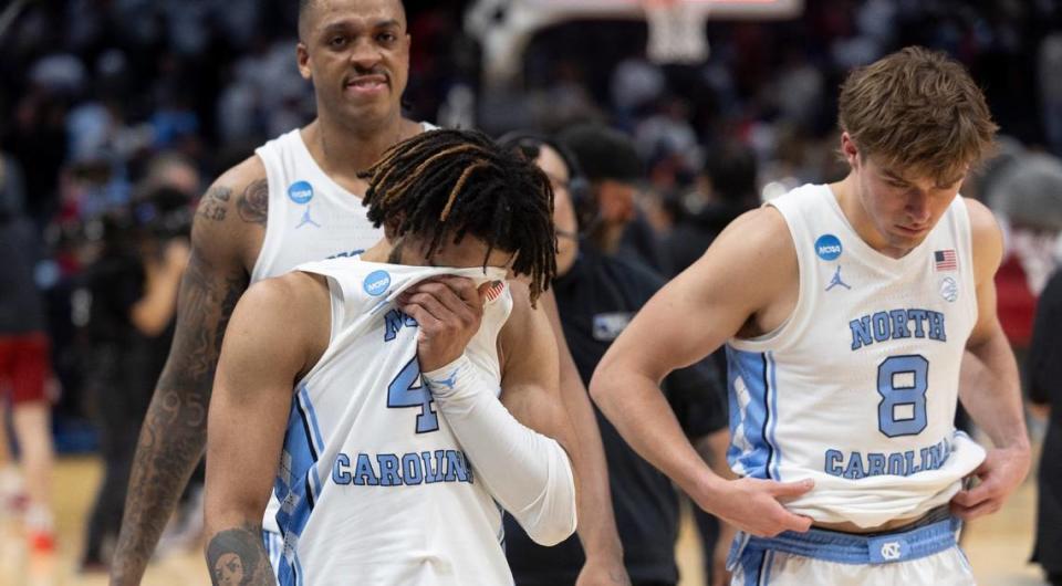 North Carolina’s R.J. Davis (4), Paxson Wojcik (8) and Armando Bacot (5) leave the court following their 89-87 loss to Alabama in the NCAA Sweet Sixteen on Thursday, March 28, 2024 at Crypto.com Arena in Los Angeles, CA.