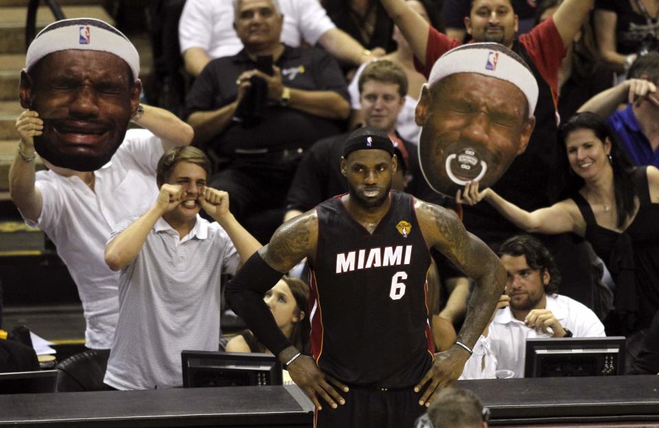 RNPS YEAR END 2014 - BEST OF SPORT ODDLY San Antonio Spurs fans taunt Miami Heat's LeBron James during the third quarter in Game 2 of their NBA Finals basketball series in San Antonio, Texas, in this June 8, 2014 file photo. REUTERS/Mike Stone/Files (UNITED STATES - Tags: SPORT BASKETBALL TPX IMAGES OF THE DAY)