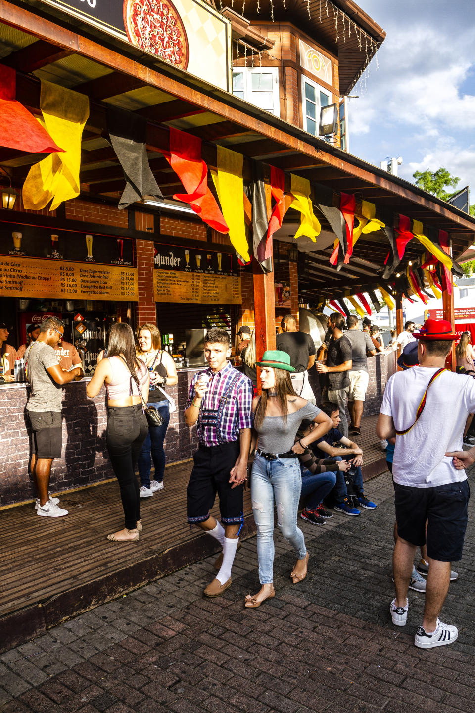 People walk around the 2018 Oktoberfest celebration in Blumenau, Brazil