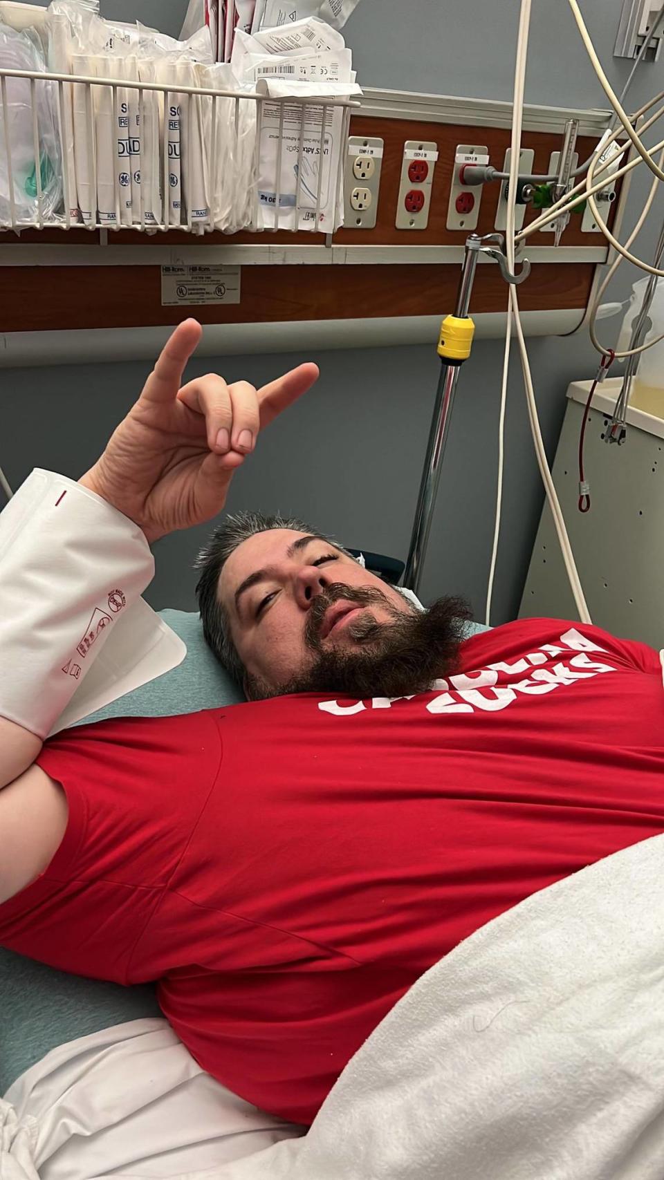 NC State fan Greg Haas, 44, was transported to a nearby UNC Rex hospital after breaking his leg in two places in the aftermath of the Wolfpack’s win over UNC-Chapel Hill on Nov. 26, 2021.