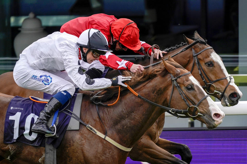 <p>Baryshnikov ridden by Connor Beasley (left, white silks) beats Spirit Dancer ridden by Paul Hanagan to win the Destination 2 Handicap during Ladies Day of the Boodles May Festival 2021 at Chester Racecourse. Picture date: Thursday May 6, 2021. See PA story RACING Chester. Photo credit should read: Alan Crowhurst/PA Wire. RESTRICTIONS: Use subject to restrictions. Editorial use only, no commercial use without prior consent from rights holder.</p>
