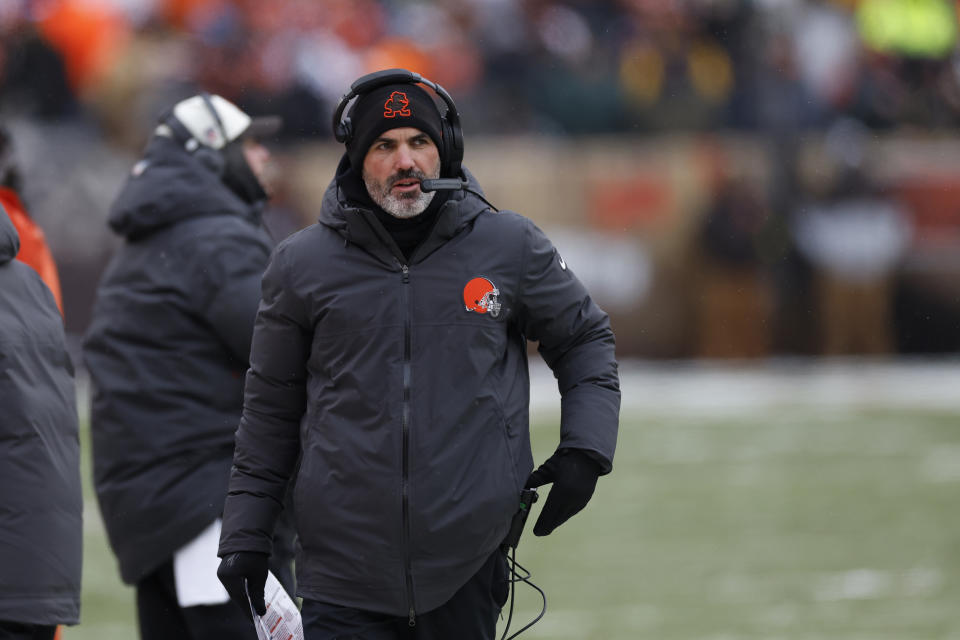 Cleveland Browns head coach Kevin Stefanski walks the sideline during the first half of an NFL football game against the New Orleans Saints, Saturday, Dec. 24, 2022, in Cleveland. (AP Photo/Ron Schwane)