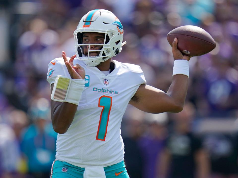 Tua Tagovailoa looks to pass against the Baltimore Ravens.