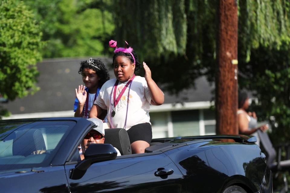 Keziah Strickland, right, and Ta'Lyssa Threat at the Scarboro Community Alumni Association Parade in July.