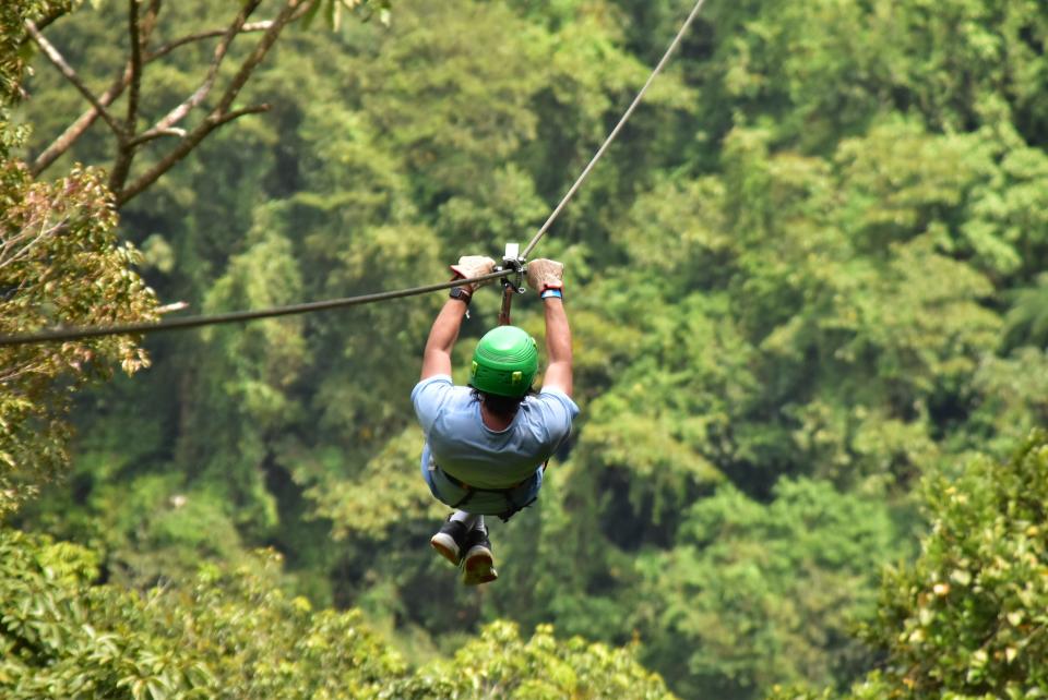 Ash Jurberg ziplining in Costa Rica