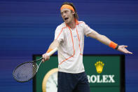 Andrey Rublev, of Russia, reacts during a match against Daniil Medvedev, of Russia, during the quarterfinals of the U.S. Open tennis championships, Wednesday, Sept. 6, 2023, in New York. (AP Photo/Seth Wenig)