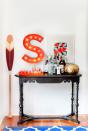 <p>Sometimes, all it takes is a personal touch to pull a room together. Take your bar cart to the next level with a retro-inspired marquee letter, colorful wall art, and a decorative oar to bring style your space.</p>