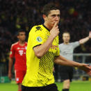 Nom: Robert Lewandowski<br>Poste: Attaquant<br>Date de naissance (Âge): 21/08/1988 (23)<br>Numéro: 9<br>Club: Dortmund<br>Taille: 184cm<br>Poids: 78kg