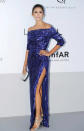 <b>Who:</b> Nina Dobrev <br> <b>What:</b> Elie Saab sequin gown <br> <b>Where:</b> AmfAR Cinema Against AIDS gala <br> <b>Why We Love It:</b>Here Dobrev manages the neat trick of making an elegant evening gown looked shrugged on like a favourite sweater. Don't get us wrong: There's nothing casual about the gowns soaring slit and textural blue sequins, but actress' offhand stance and ever-so-slightly-wispy bun make her look effortlessly statuesque. Photo by Keystone Press