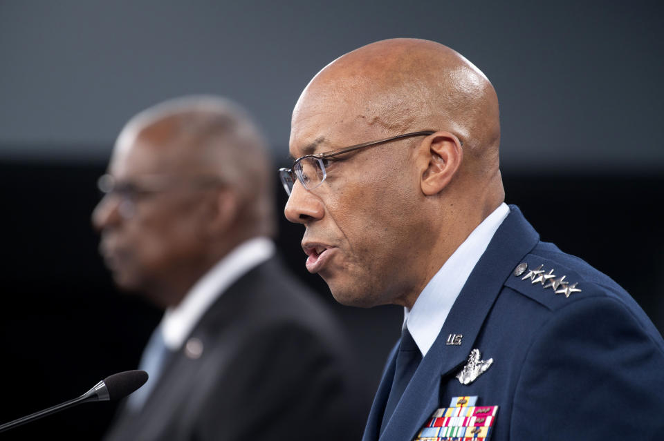 Chairman of the Joint Chiefs Of Staff Gen. Charles Q. Brown, Jr., right, speaks during a press briefing at the Pentagon with Defense Secretary Lloyd Austin on Monday, May 20, 2024 in Washington. (AP Photo/Kevin Wolf)