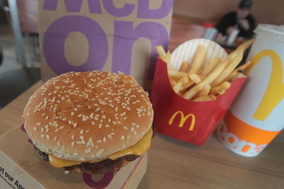 EFFINGHAM, IL - MARCH 30:  A Quarter Pounder hamburger is served at a McDonald's restaurant on March 30, 2017 in Effingham, Illinois. McDonald's announced today that it will start making the burger with fresh beef patties instead of the frozen beef that it currently uses.  (Photo Illustration by Scott Olson/Getty Images)