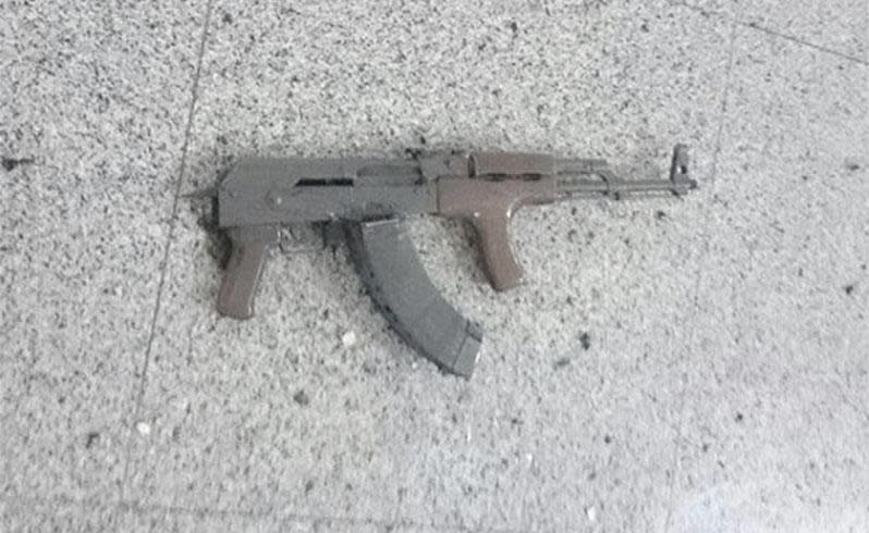 An AK-47 lies on the abandoned Ataturk international airport floor after three suicide bombers set off blasts. Photo: Reuters