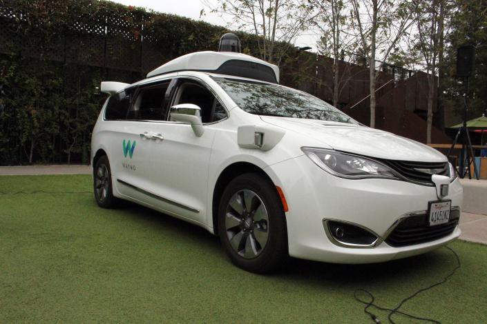 A Waymo self-driving car pulls into a parking lot at the Google-owned company&#39;s headquarters in Mountain View, California, on May 8, 2019. (Photo by Glenn CHAPMAN / AFP)        (Photo credit should read GLENN CHAPMAN/AFP via Getty Images)