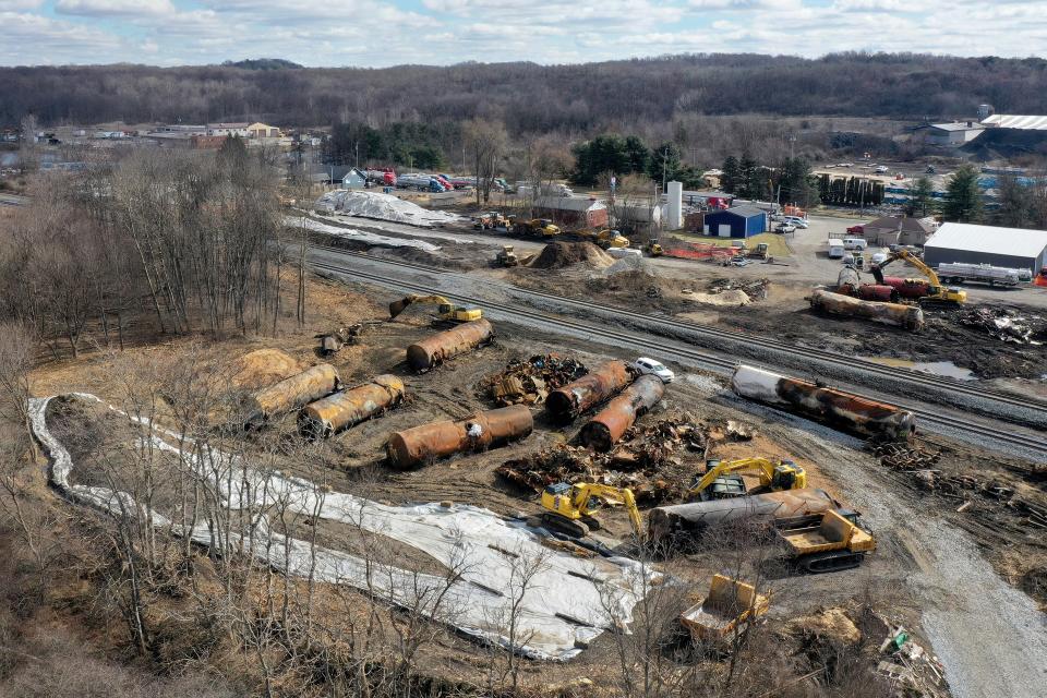 A view of the scene Friday, Feb. 24, 2023, as the cleanup continues at the site of of a Norfolk Southern freight train derailment that happened on Feb. 3 in East Palestine, Ohio. (AP Photo/Matt Freed)