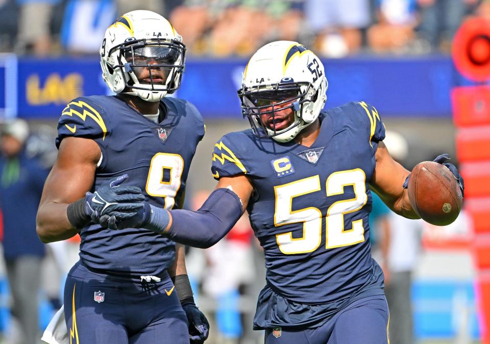Los Angeles Chargers linebacker Khalil Mack (52) celebrates after a touchdown in the first half against the Seattle Seahawks at SoFi Stadium.