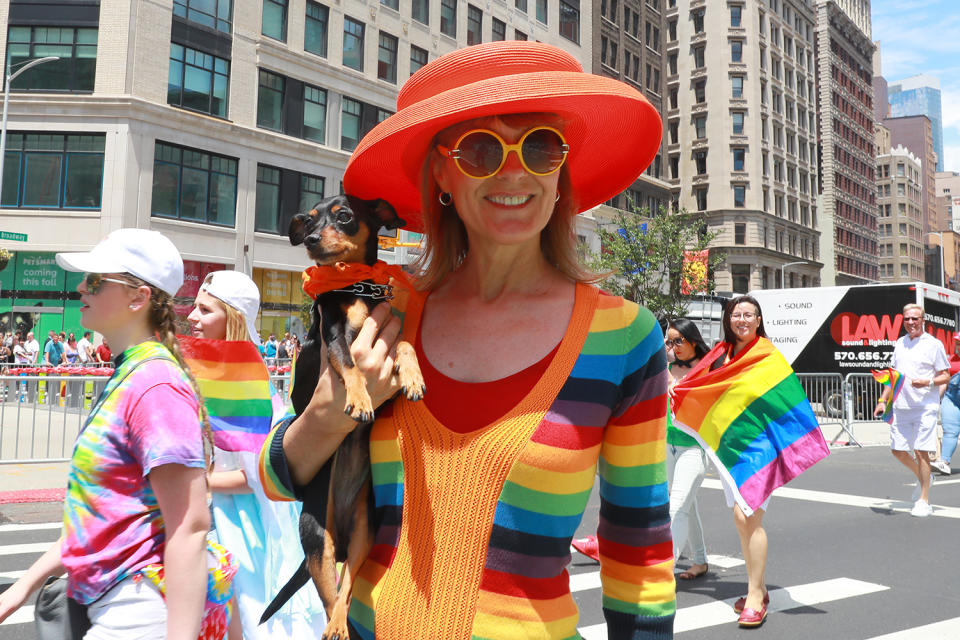 <p>Julia Harvey of New York City carries participant Gypsy in the N.Y.C. Pride Parade in New York on June 25, 2017. (Photo: Gordon Donovan/Yahoo News) </p>