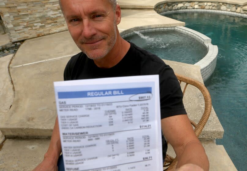 LOS ANGELES, CALIF. - FEB. 6, 2023. Long Beach resident Brent Eldridge, 48, received a $907.13 gas bill in January. He suspects it was from running his jacuzzi. (Luis Sinco / Los Angeles Times)