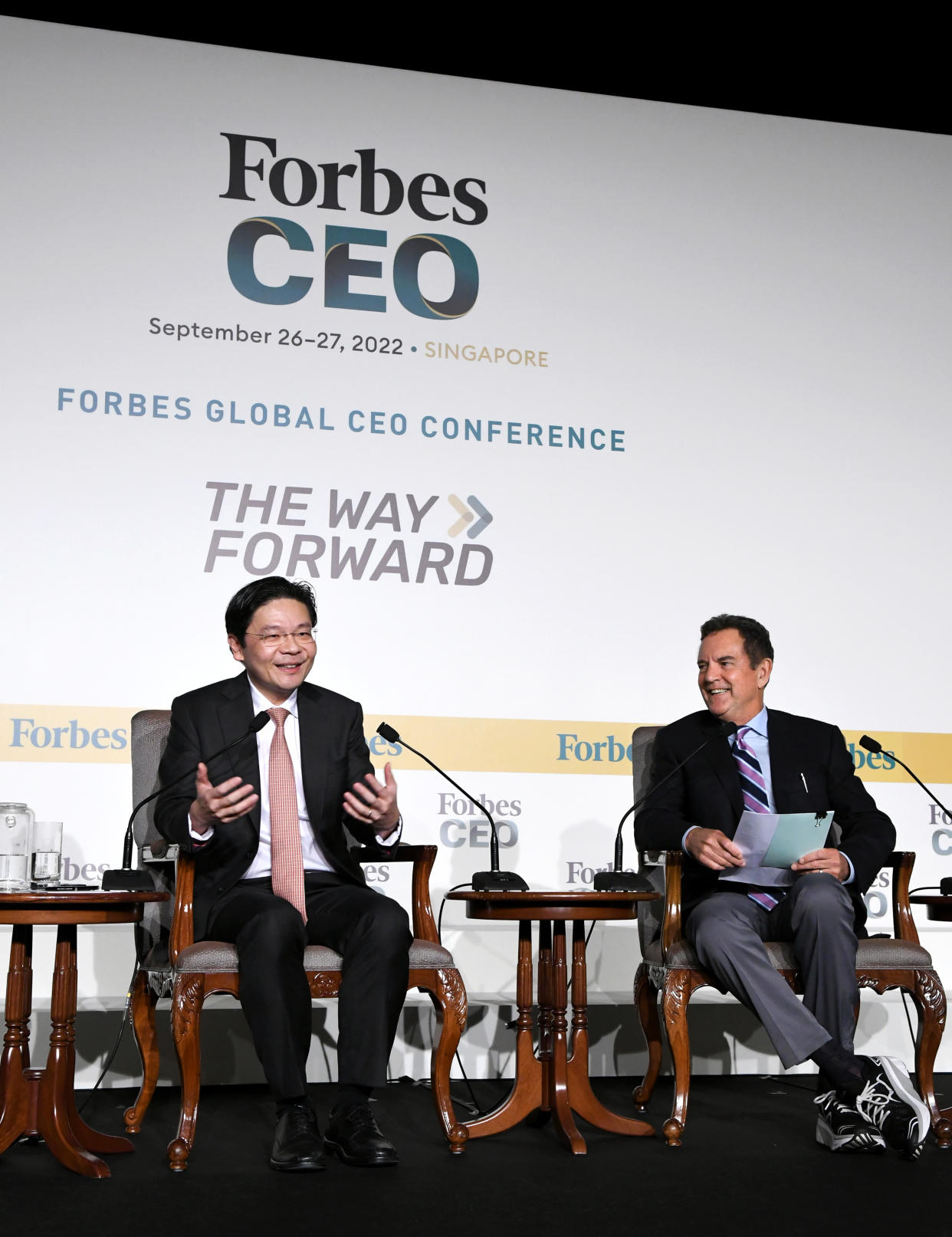 Singapore's Deputy Prime Minister Lawrence Wong (left) at the Forbes Global CEO Conference gala dinner. Moderating the chat is Rich Karlgaard, Futurist and Editor-at-Large, Forbes Media. (PHOTO: Forbes Global CEO Conference)