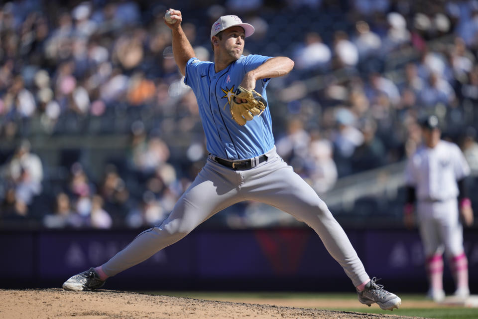 Tampa Bay Rays relief pitcher Jason Adam (47) throw in the ninth inning of a baseball game against the New York Yankees, Sunday, May 14, 2023, in New York. (AP Photo/John Minchillo)