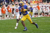 Pittsburgh wide receiver Taysir Mack (11) makes a catch of a long pass past Clemson linebacker Barrett Carter (0) and takes in for a touchdown during the first half of an NCAA college football game, Saturday, Oct. 23, 2021, in Pittsburgh. (AP Photo/Keith Srakocic)