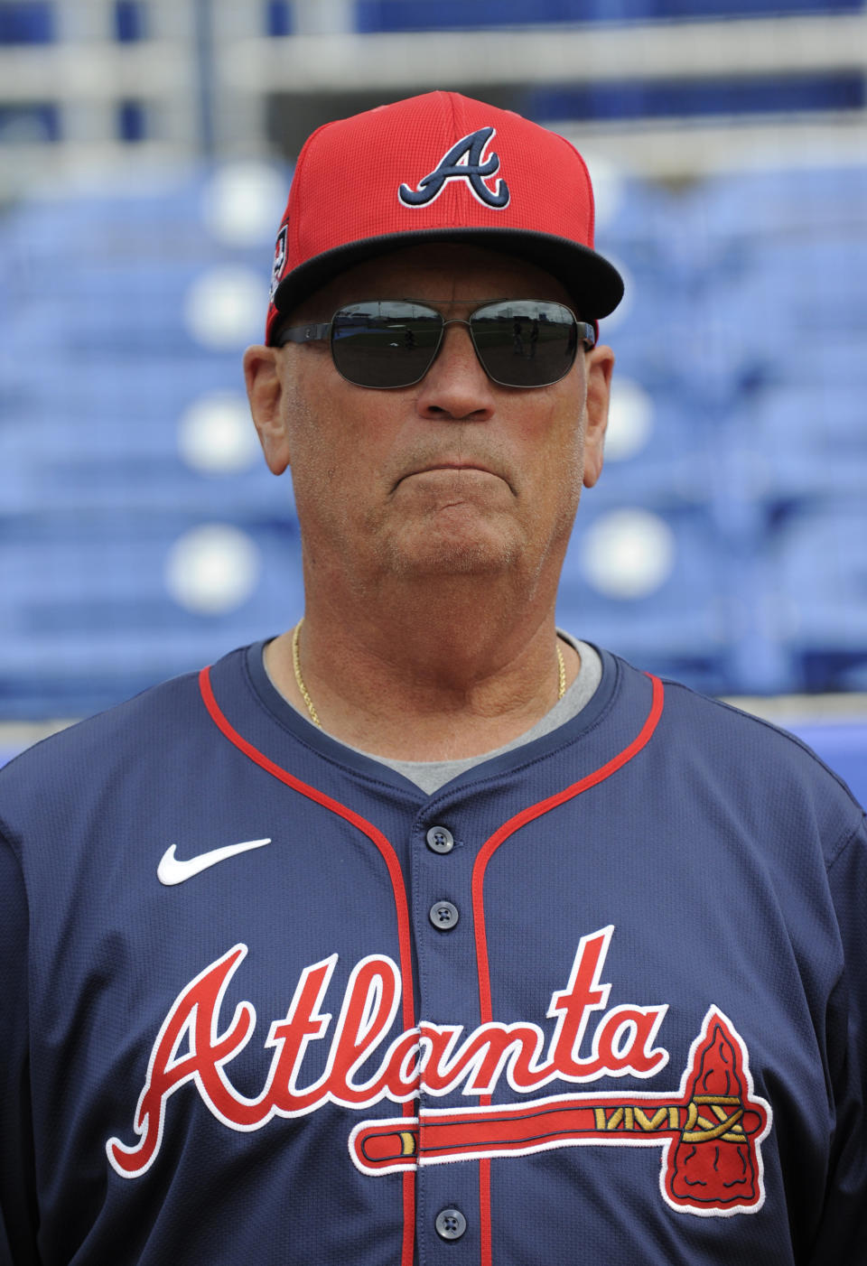 Atlanta Braves manager Brian Snitker watches batting practice before a spring training baseball game against the Toronto Blue Jays, Saturday, March 2, 2024, in Dunedin, Fla. (Mark Taylor/The Canadian Press via AP)