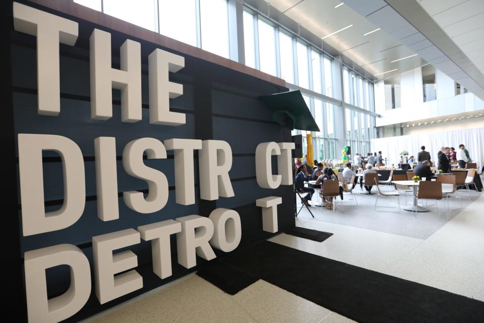 The atrium of the new Mike Ilitch School of Business features a large 3-D sign of the The District Detroit at Wayne State University's downtown campus in Detroit on Tuesday, Aug. 21, 2018. 