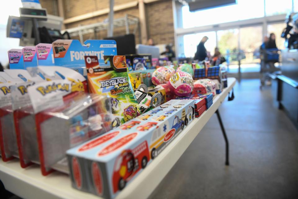 Toys sit out on a table during the Columbia County Sheriff's Office Day with a Deputy at Walmart on Thursday, Dec. 21, 2023.