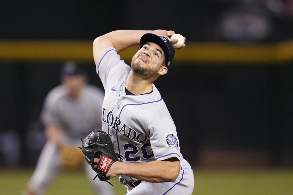 Colorado Rockies relief pitcher Peter Lambert throws against the Arizona Diamondbacks during the fourth inning of a baseball game Wednesday, May 31, 2023, in Phoenix. (AP Photo/Ross D. Franklin)