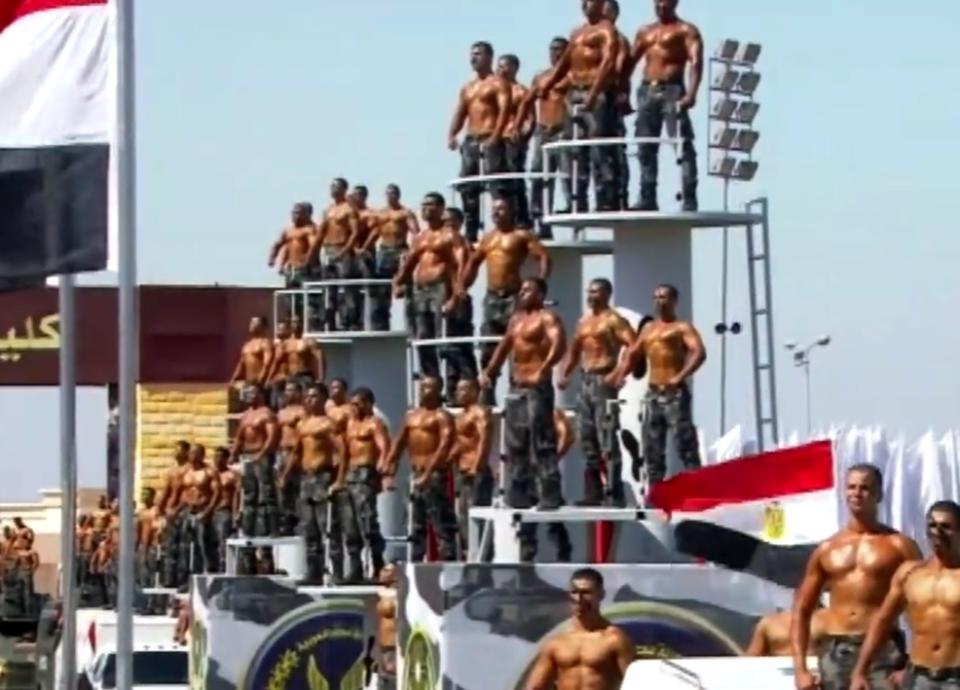 Cadets jump through hoops and pull tanks.jpeg (Screengrab/YouTube)