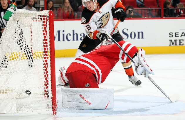 RALEIGH, NC - NOVEMBER 10: Jakob Silfverberg #33 of the Anaheim Ducks finds the back of the net past Cam Ward #30 of the Carolina Hurricanes for his first goal of the second period during an NHL game on November 10, 2016 at PNC Arena in Raleigh, North Carolina. (Photo by Gregg Forwerck/NHLI via Getty Images)