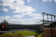 Players are seen on the field at Camden Yards ballpark during the Baltimore Orioles against Chicago White Sox America League baseball game in Baltimore, Maryland April 29, 2015. In what will be a first for Major League Baseball, the Baltimore Orioles will host the Chicago White Sox on Wednesday in a stadium closed to fans as Baltimore copes with some of the worst U.S. urban rioting in years. REUTERS/Eric Thayer