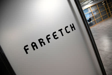 Branding for online fashion house Farfetch is seen at the company headquarters in London, Britain January 31, 2018. REUTERS/Toby Melville