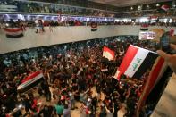 Thousands of Iraqi protesters invaded the main session hall of the parliament in Baghdad on April 30, 2016