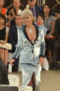 <p>Rita Ora, who seemingly forgot a shirt (and bra, for that matter), accented her cleavage with a diamond chain. She also wore a sky blue silk blazer and skirt with a dangerously high front slit.</p>